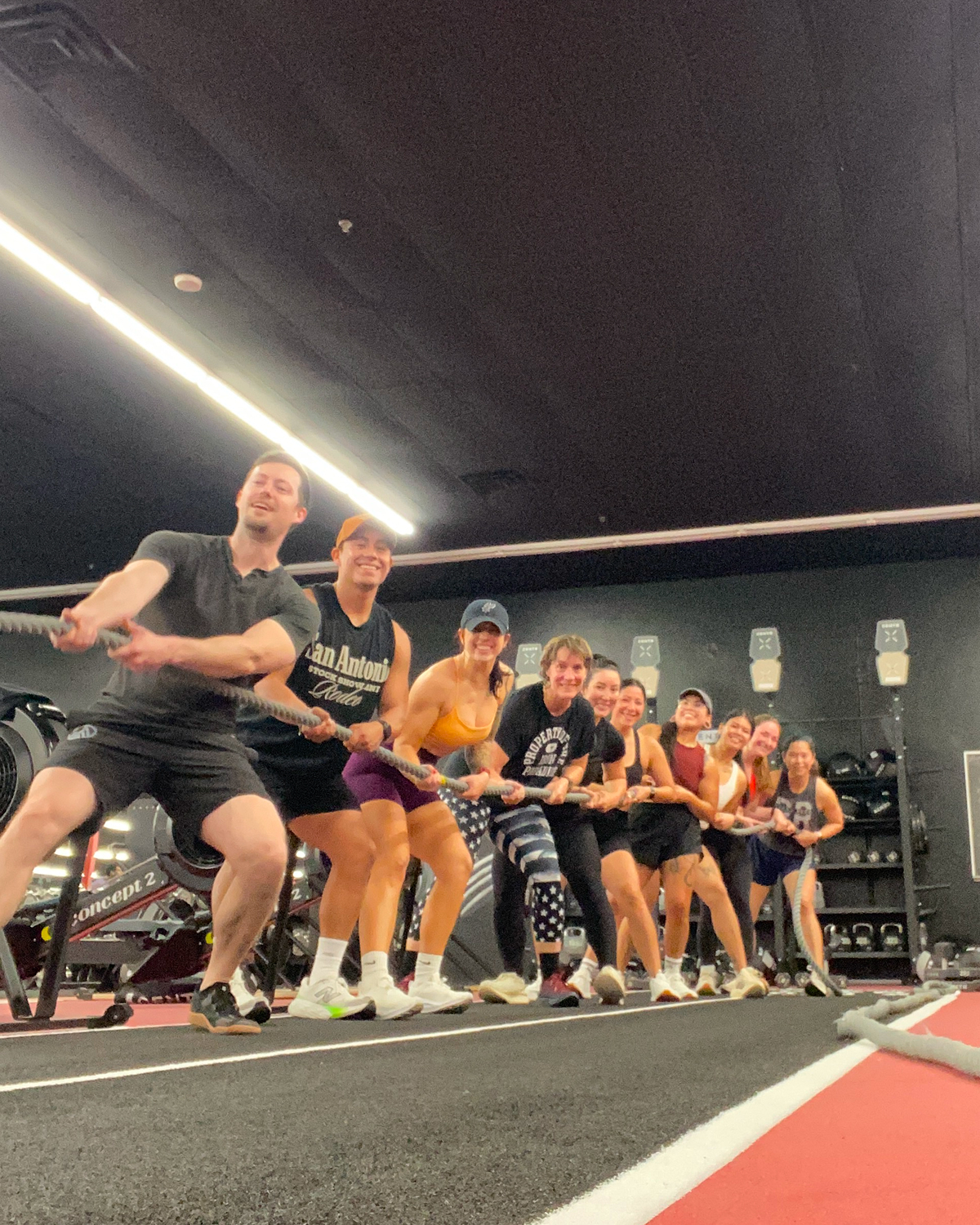 Hyrox athletes pulling a sled together at Los Campeones